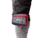 Nokta DetectoBag hip pouch in grey and red with zippered pockets, worn on a belt for metal detecting accessories.