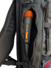 Nokta Pointer stored in the side zipper pocket of a black Nokta DetectoBag metal detecting backpack.